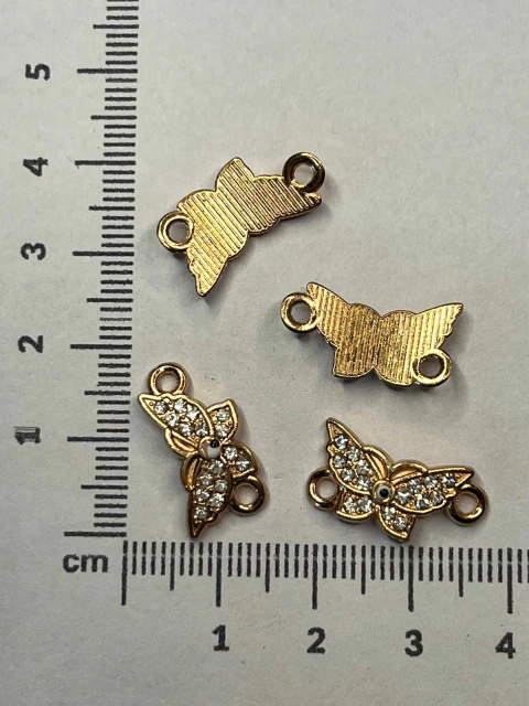 DIJE DE STRASS DORADO x unidad