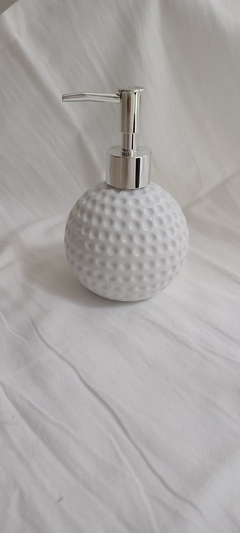 Dispenser de cerámica redondo.