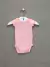 Conjunto Bebe Casaco Body e Calça Rosa First Impressions Carter's na internet