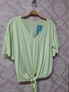 Blusa de amarrar na internet