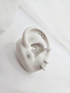 Piercing ramo com zircônias na internet