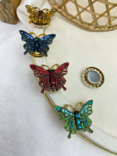 Broche M azul borboleta de IMA pk144 na internet
