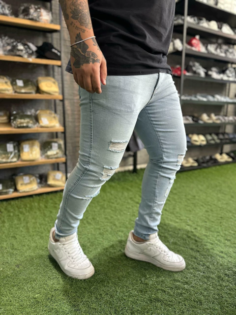 Calça jeans destroyed golden details - DELAVE RASGADO - comprar online