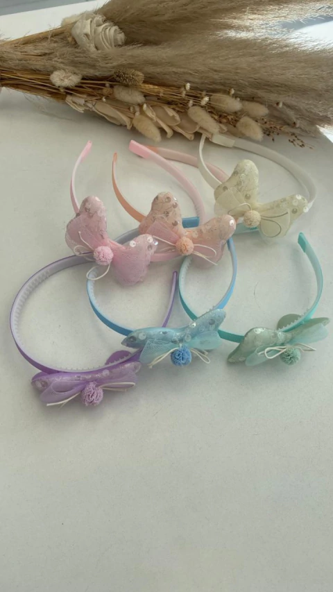 VINCHA INFANTIL CON MOÑO