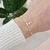 Pulseira de Prata Detalhes Elos Bolinhas Cruz Cravejada