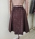 Saia Midi Pregas Marrom Café - comprar online