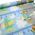 Gabardina Estampada Premium por Corte Gris Con Conejos y Autos - comprar online