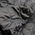 Matelasse Puffer Negro