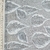 Cuerina Alfa Estampada Gris Hojas Relieve Blanco - comprar online