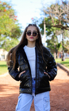 Campera metalizada con bolsillos plaque y piel por dentro de nena