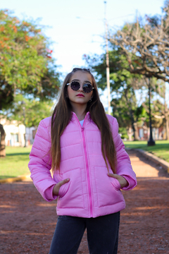 Campera lisa con bolsillos plaque con piel por dentro de nena