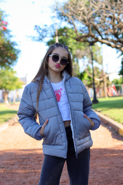 Campera lisa con bolsillos plaque con piel por dentro de nena