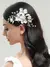 Arranjo de cabelo floral com pérolas e miçangas. na internet