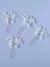 Grampos de cabelo decorado com flores e pérolas na internet
