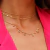 CHOKER COM BOLINHAS LISAS DISPERSAS BANHADA A OURO