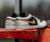 JORDAN 1 LOW GOLD SWOOSH - comprar online