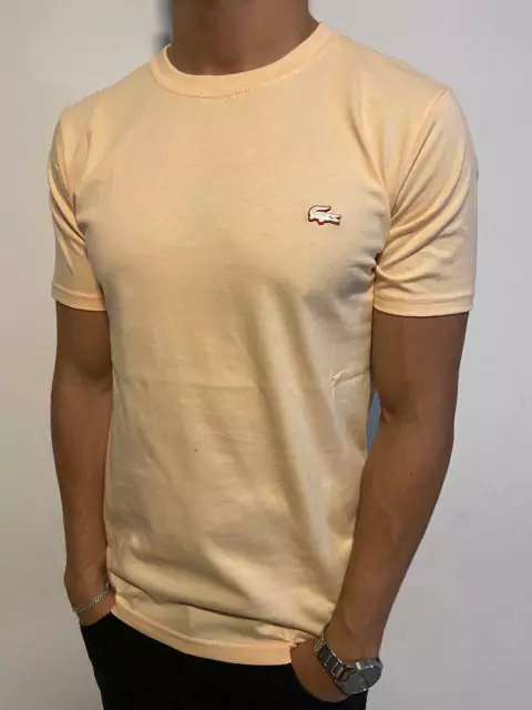 Remera coco goma LACOSTE durazno