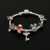Pulseira com Pingentes Mundo Mágico