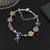 Pulseira com Pingentes Brasões Heróis