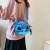 Bolsa Transversal Stitch de Pelúcia