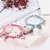 Imagem do Par de Pulseiras Lilo & Stitch Coração Magnético Trançadas