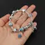 Pulseira com Pingentes Alice