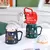 Caneca Natalina Globo de Neve c/ Colher Decorativa na internet