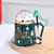 Caneca Natalina Globo de Neve c/ Colher Decorativa na internet
