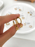 Argollas Estrellas - Acero Dorado - comprar online