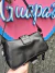 Cartera con hebilla negra en internet