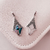 Pingente Flor de Liz Arabescos - Prata 925 - comprar online