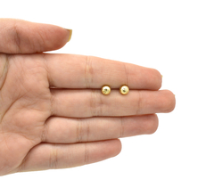 Broqueles Media Bolita Facetada 5.5mm. Oro 10k - comprar en línea
