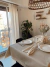 Mantel impermeable premium beige con fleco grande - tienda online