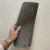 Individual impermeable gris estandar (dobladillo)