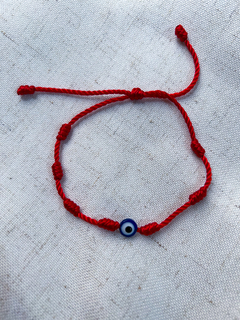 Pulseira Vermelha com 7 nós na internet