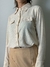 Camisa com brilhos tecido 100% fibra e bolsos na frente - loja online