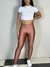 Calça legging cintura alta com bolso brilhosa K2B Lirasi na internet