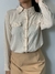 Camisa com brilhos tecido 100% fibra e bolsos na frente na internet