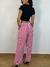 Calça pantalona listrada com forro em chifon na internet