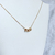 Colar com Pingente de Dados, Cravejados com Zircônias, Banhado em Ouro 18k - comprar online