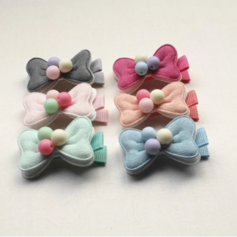 Lacinho com pérolas bebê