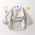 Babador Avental Impermeável com Bolso - Proteção Completa para o Seu Bebê
