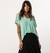Conjunto Blusa Transpassada Pistache e Saia Midi Eloa Preta - comprar online