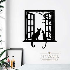 VENTANA CON GATOS