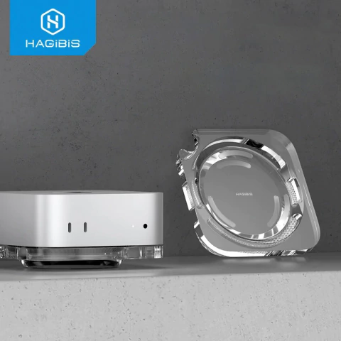 Suporte transparente à prova de poeira para Mac Mini M4 da marca Hagibis, exibido ao lado do Mac Mini em superfície cinza
