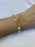 Pulseira Feminina Cartier com Pérolas Banhada Ouro 18k na internet