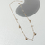 Colar Chocker ostras e ponto de luz - loja online