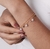 Pulseira pérolas e ponto de luz