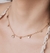 Colar Chocker ostras e ponto de luz