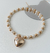 Chocker pérolas com pingente de coração na internet